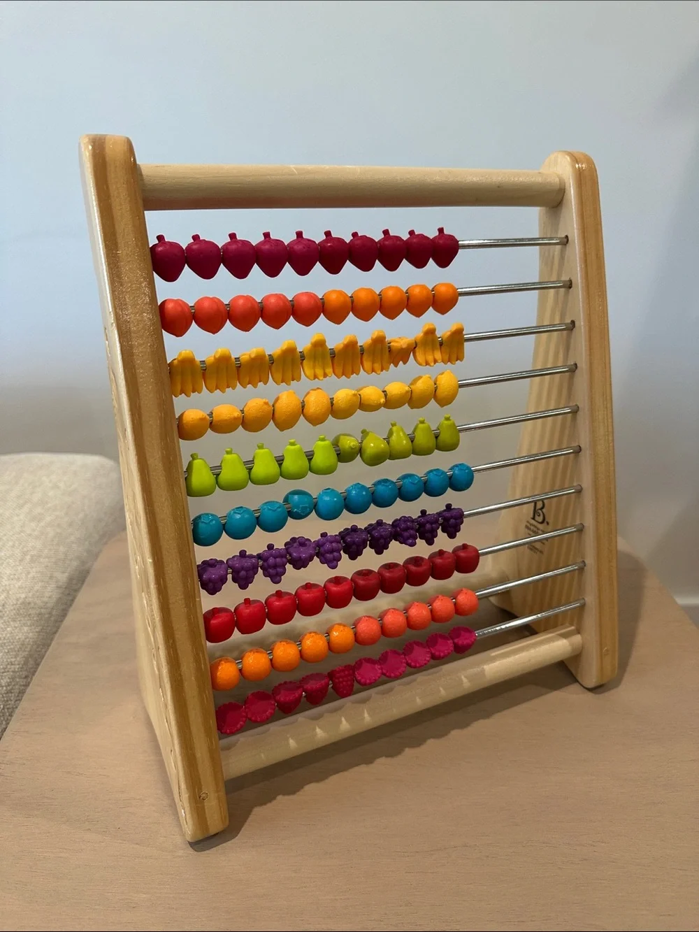 B. toys Wooden Abacus, Two-Ty Fruity Counting Toy